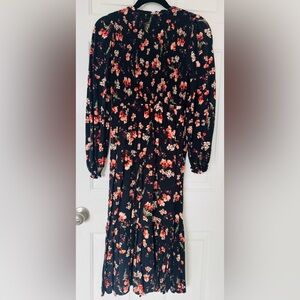 Floor length flower patterned black summer dress.